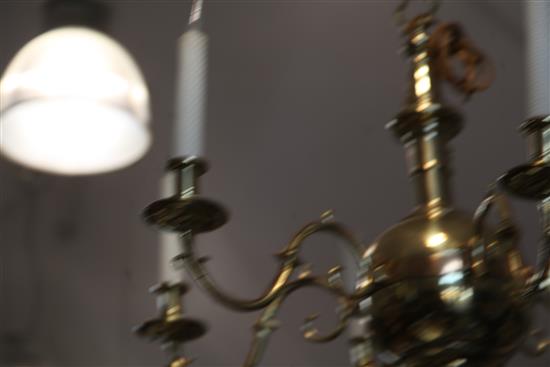 A pair of 17th century style Dutch design six branch ball and column ceiling chandeliers